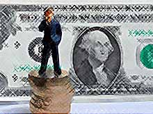 Курс доллара впервые за месяц вырос  более 65 рублей