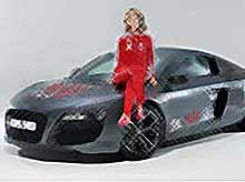 Ксения Собчак и Андрей Малахов представили Олимпийский автомобиль Audi R8 